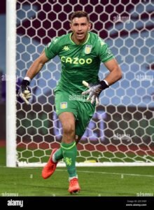 SHOCKING NEWS: Aston villa FC goalkeeper Emiliano Martínez has gun for a serious injury while trying to save a penalty kick which.... see more - Uncategorize 