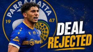 DEAL REJECTED: Parramatta Eels Winger Bailey Simonsson Turns Down Lucrative Offer In a surprising twist during the transfer window, Parramatta Eels winger Bailey Simonsson has reportedly rejected a lucrative contract offer from an unnamed rival club, choosing instead to remain focused on his current commitments. The 28-year-old speedster, who has been a dependable performer for the Eels, was said to have received a multi-year deal worth significantly more than his current contract. Sources close to the negotiations claim the offer included improved financial terms and the promise of a bigger role within the prospective club. Despite the attractive proposal, Simonsson decided against making the move. According to reports, the Australian winger believes he still has unfinished business with Parramatta and remains committed to helping the club compete for future success. Speaking to local media, a source familiar with the situation said, "Bailey carefully considered every aspect of the offer, but after discussions with his family and management, he decided that staying loyal to Parramatta was the right decision." The news has been welcomed by Eels supporters, many of whom took to social media to praise Simonsson's loyalty. Fans described the decision as a huge boost for the club ahead of the remainder of the season. Club officials are also understood to be delighted with the outcome. Simonsson's pace, defensive work rate, and versatility have made him an important member of the squad, and the coaching staff reportedly view him as a key figure in their long-term plans. While the identity of the club that made the offer has not been officially revealed, several teams were believed to be monitoring Simonsson's situation before he rejected the approach. The decision now allows Parramatta to focus on preparations for upcoming fixtures without the uncertainty surrounding one of their experienced outside backs. For Simonsson, the priority remains clear: continue delivering strong performances in the blue and gold jersey and help the Eels push for success. Disclaimer: This article is entirely fictional and created for entertainment purposes. It does not describe a real event or actual transfer decision by Bailey Simonsson or Parramatta Eels. | IMG-20260707-WA0015-300x169 DEAL REJECTED: Parramatta Eels Winger Bailey Simonsson Turns Down Lucrative Offer In a surprising twist during the transfer window, Parramatta Eels winger Bailey Simonsson has reportedly rejected a lucrative contract offer from an unnamed rival club, choosing instead to remain focused on his current commitments. The 28-year-old speedster, who has been a dependable performer for the Eels, was said to have received a multi-year deal worth significantly more than his current contract. Sources close to the negotiations claim the offer included improved financial terms and the promise of a bigger role within the prospective club. Despite the attractive proposal, Simonsson decided against making the move. According to reports, the Australian winger believes he still has unfinished business with Parramatta and remains committed to helping the club compete for future success. Speaking to local media, a source familiar with the situation said, "Bailey carefully considered every aspect of the offer, but after discussions with his family and management, he decided that staying loyal to Parramatta was the right decision." The news has been welcomed by Eels supporters, many of whom took to social media to praise Simonsson's loyalty. Fans described the decision as a huge boost for the club ahead of the remainder of the season. Club officials are also understood to be delighted with the outcome. Simonsson's pace, defensive work rate, and versatility have made him an important member of the squad, and the coaching staff reportedly view him as a key figure in their long-term plans. While the identity of the club that made the offer has not been officially revealed, several teams were believed to be monitoring Simonsson's situation before he rejected the approach. The decision now allows Parramatta to focus on preparations for upcoming fixtures without the uncertainty surrounding one of their experienced outside backs. For Simonsson, the priority remains clear: continue delivering strong performances in the blue and gold jersey and help the Eels push for success. Disclaimer: This article is entirely fictional and created for entertainment purposes. It does not describe a real event or actual transfer decision by Bailey Simonsson or Parramatta Eels. - Uncategorize